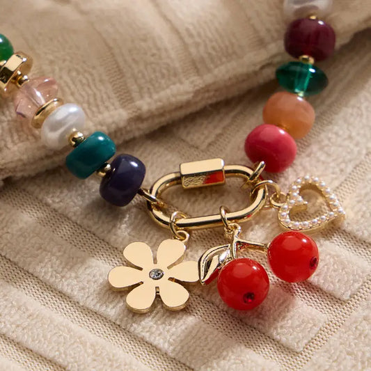 Vibrant Beaded Bracelet with Gold-Tone Trio Charms