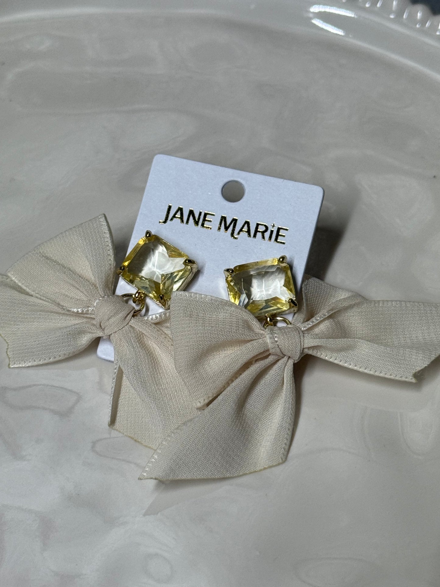 JM Bow earrings