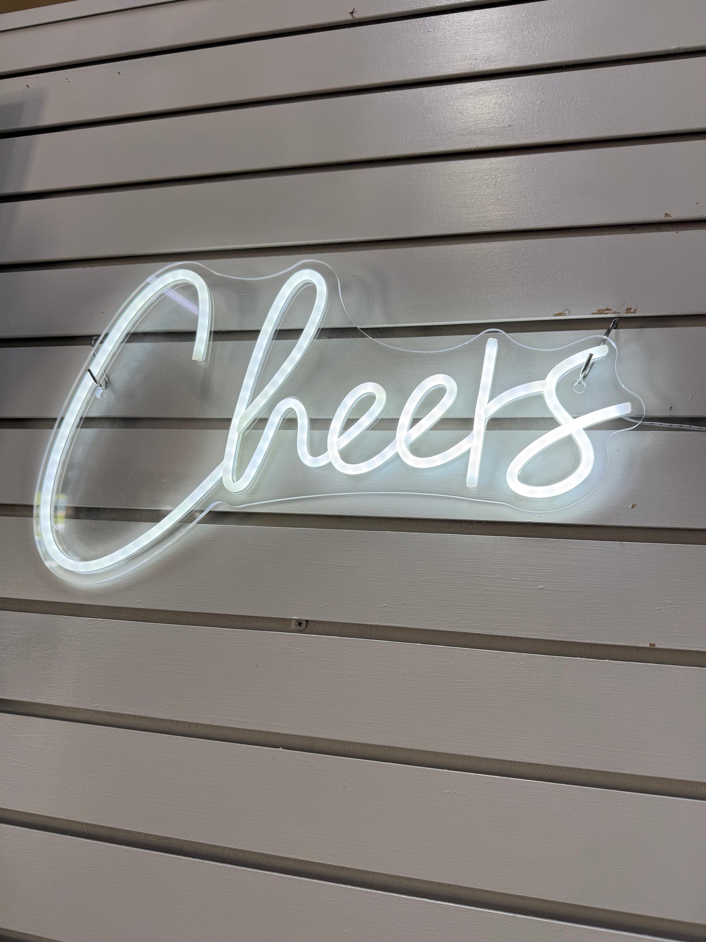Neon “Cheers” sign